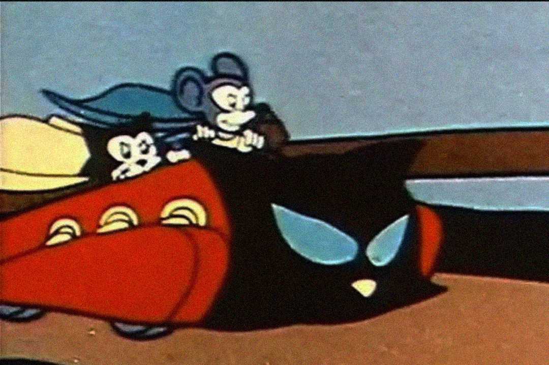 Two cartoon mice ride in a red car with a black cat-shaped front. The scene has a vintage animation style with muted colors and a simple background.
