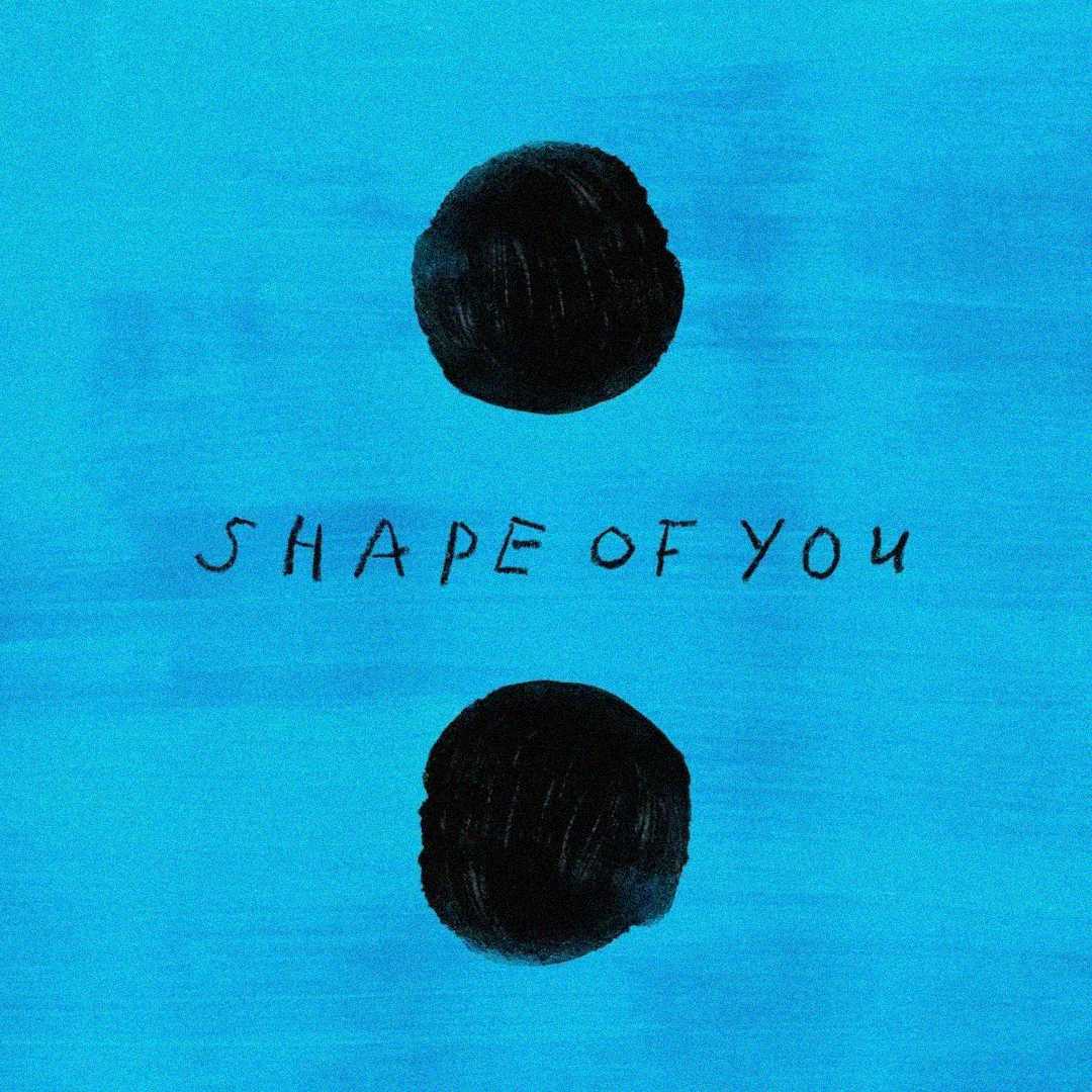 A blue background with two large black dots, one near the top and one near the bottom, and the handwritten text “SHAPE OF YOU” in the center.