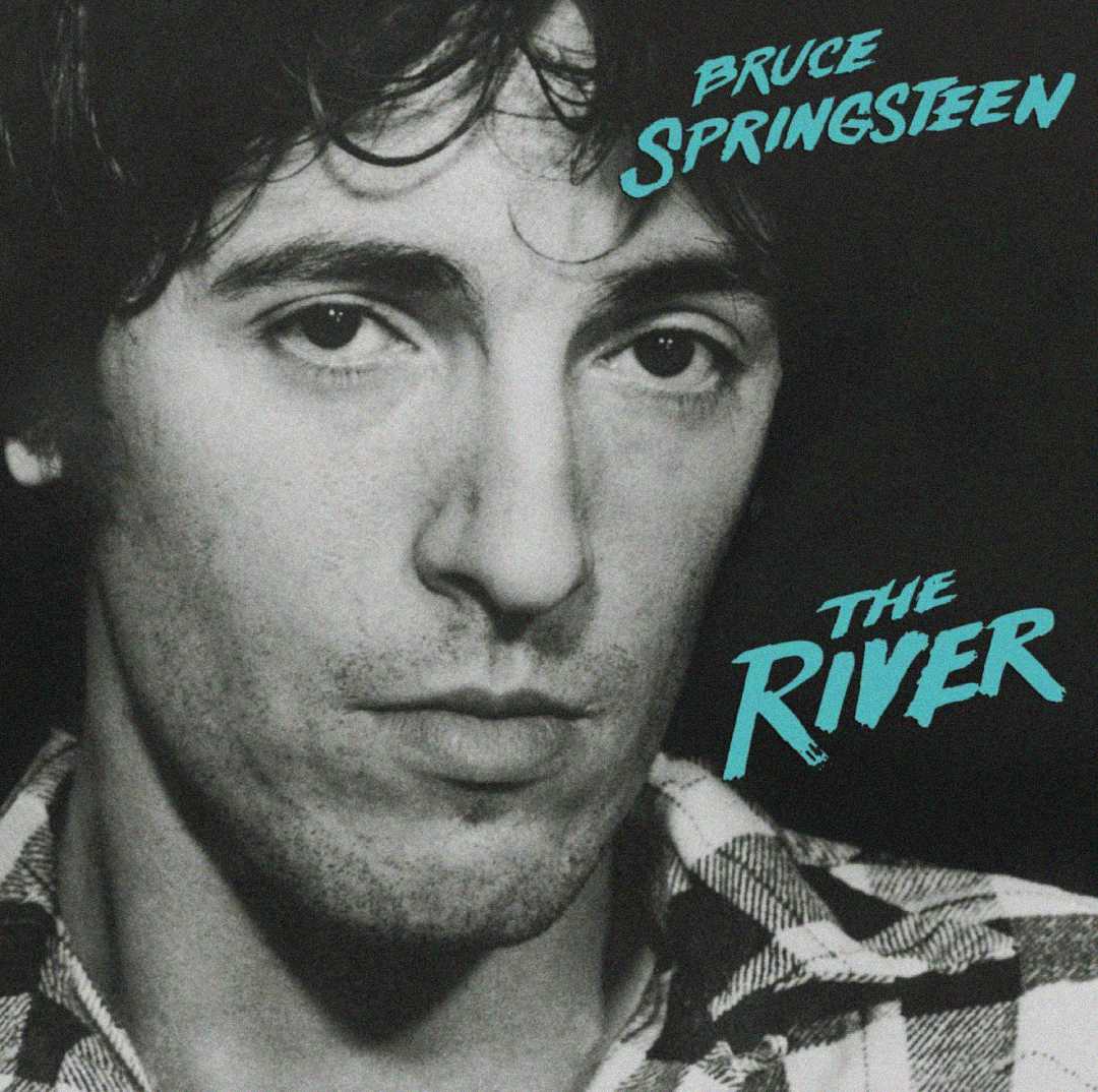 Close-up black-and-white photo of a man with a serious expression, wearing a plaid shirt. Blue text in the top right reads "BRUCE SPRINGSTEEN" and in the bottom right reads "THE RIVER".