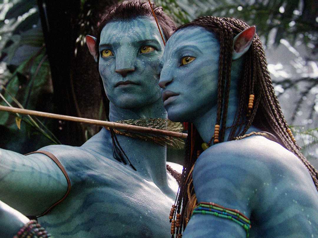 Two blue-skinned, humanoid characters with yellow eyes and braided hair stand close together in a lush, green forest. One holds a bow, aiming an arrow. Both wear beaded jewelry and appear alert and focused.
