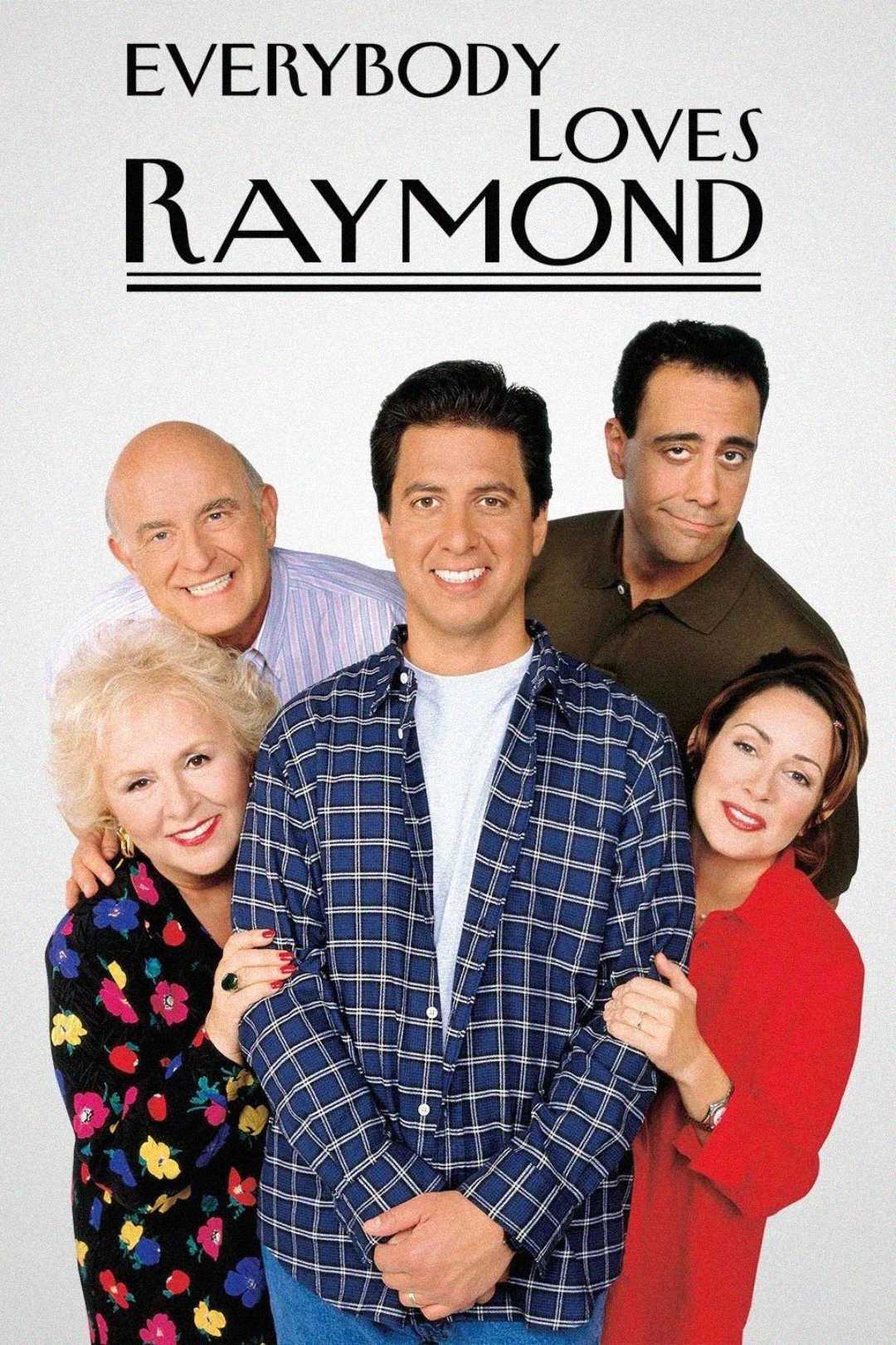 Five people pose closely together and smile in front of a white background with the text "Everybody Loves Raymond" above them, which is the logo for the TV show.