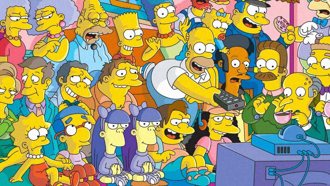 A group of cartoon characters from The Simpsons sit together in a living room, watching TV. Homer is reaching for the remote, while others, including Bart, Lisa, and Marge, are gathered around, smiling and interacting.