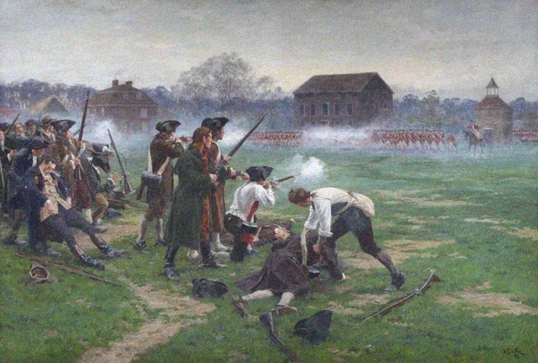 Colonial militiamen exchange gunfire with British redcoats on a grassy field, some men wounded or fallen, with historic buildings and smoke in the background, depicting a scene from the American Revolutionary War.