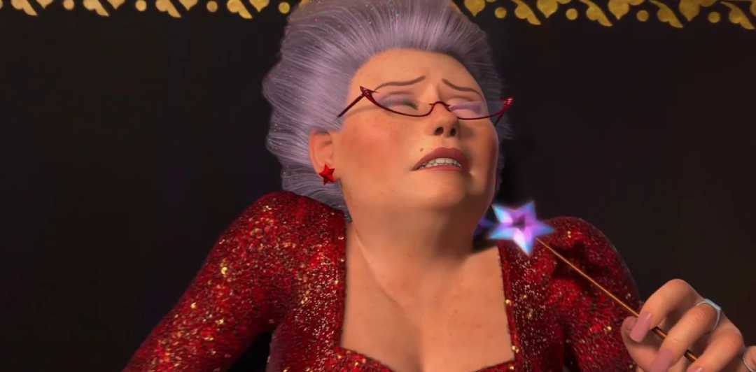 An animated elderly woman with short purple hair and red glasses wears a sparkly red dress and holds a glowing star-tipped wand, looking distressed with her eyes closed.