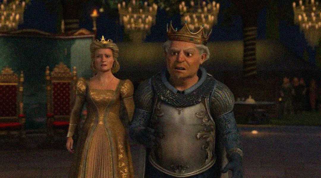 A woman in a gold gown and crown stands beside an older man in a crown and armor, both looking surprised or concerned, in a grand, dimly-lit hall with chandeliers and ornate chairs in the background.