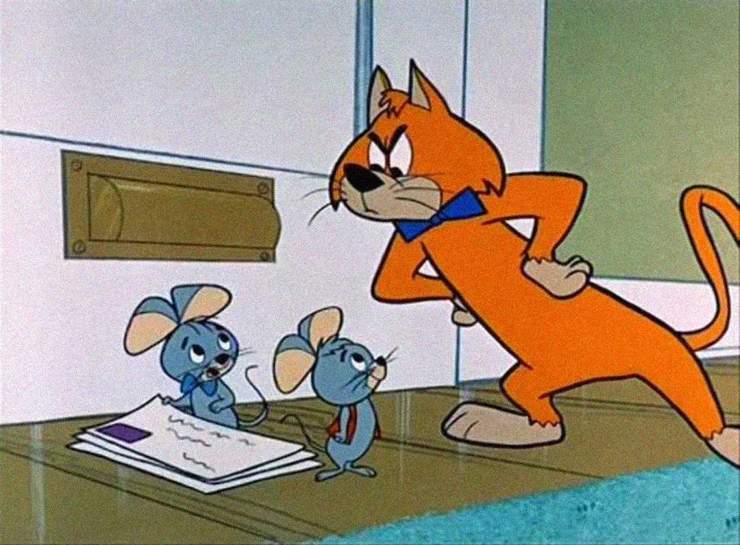 A cartoon orange cat with a blue bow tie glares at two blue mice in ties, who stand next to a pile of letters by a mail slot in a door.