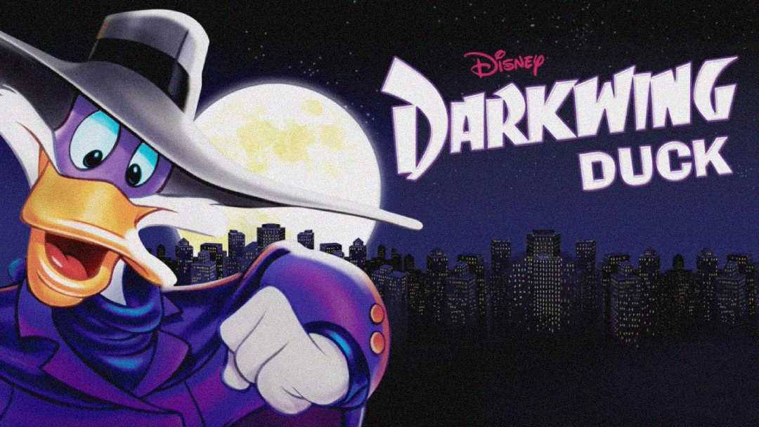 An animated duck in a purple hat and coat poses heroically in front of a city skyline at night with a full moon. The text reads "Disney Darkwing Duck" in bold letters.