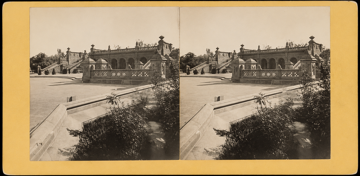 A sepia-tone stereograph shows the ornate Bethesda Terrace with arched stone railings and balustrades in Central Park, New York City, under a clear sky, surrounded by trees and paved open space.
