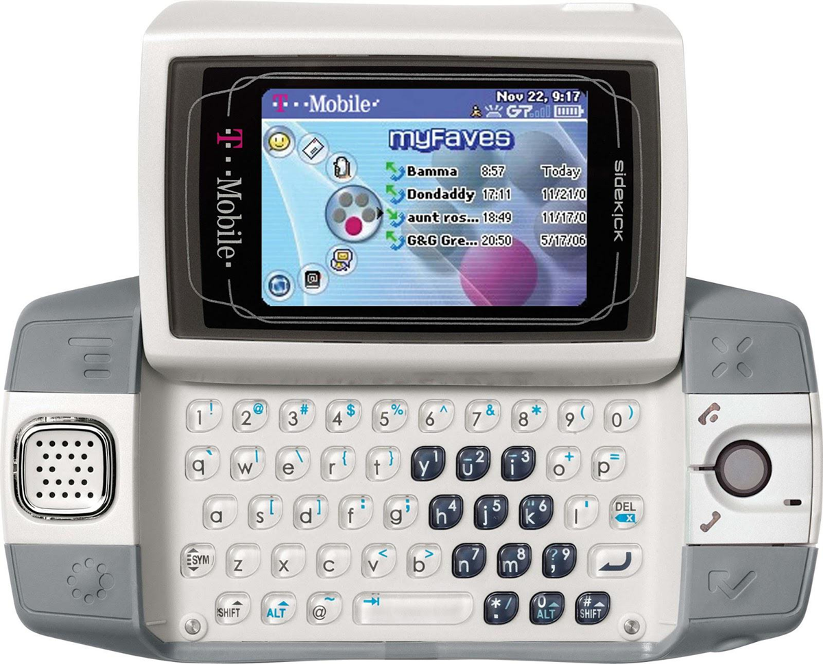 A T-Mobile Sidekick mobile phone with a flipped-up screen displaying the "myFaves" contacts. The phone features a full QWERTY keyboard, physical buttons, and navigation controls.