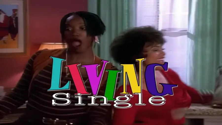 Two women stand smiling indoors in front of a window, with the colorful text "Living Single" overlaid in large letters.