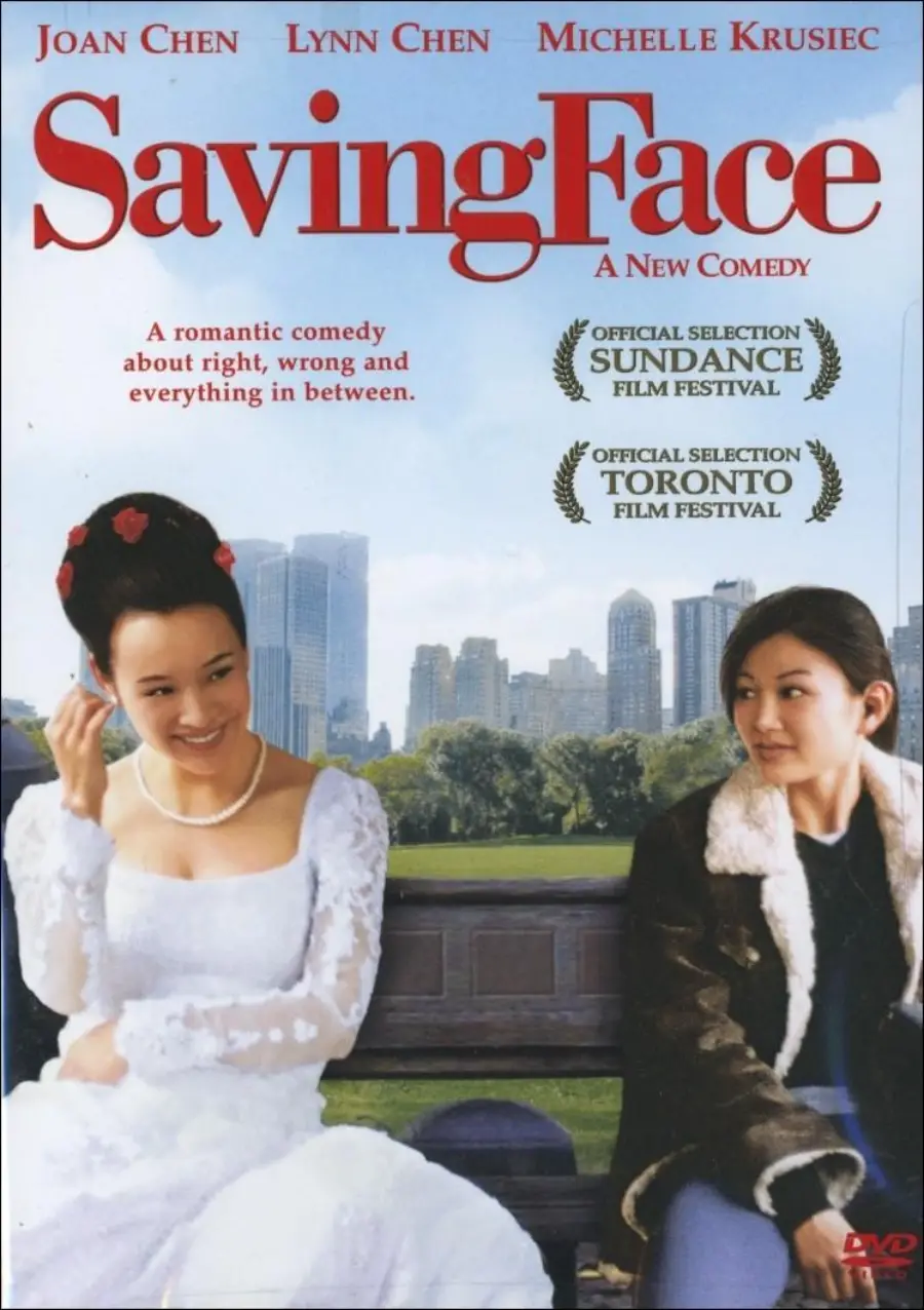 DVD cover for "Saving Face" shows two women—one in a wedding dress, the other in casual clothes—sitting on a bench with a city skyline behind them. Festival selection badges and cast names appear at the top.