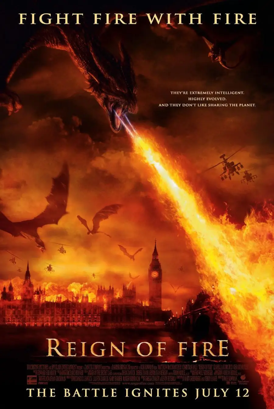 A dragon breathes fire over a burning city, with Big Ben and the London Eye visible. Other dragons fly in the smoky orange sky. Text reads “Reign of Fire,” with the tagline “Fight Fire with Fire” above.