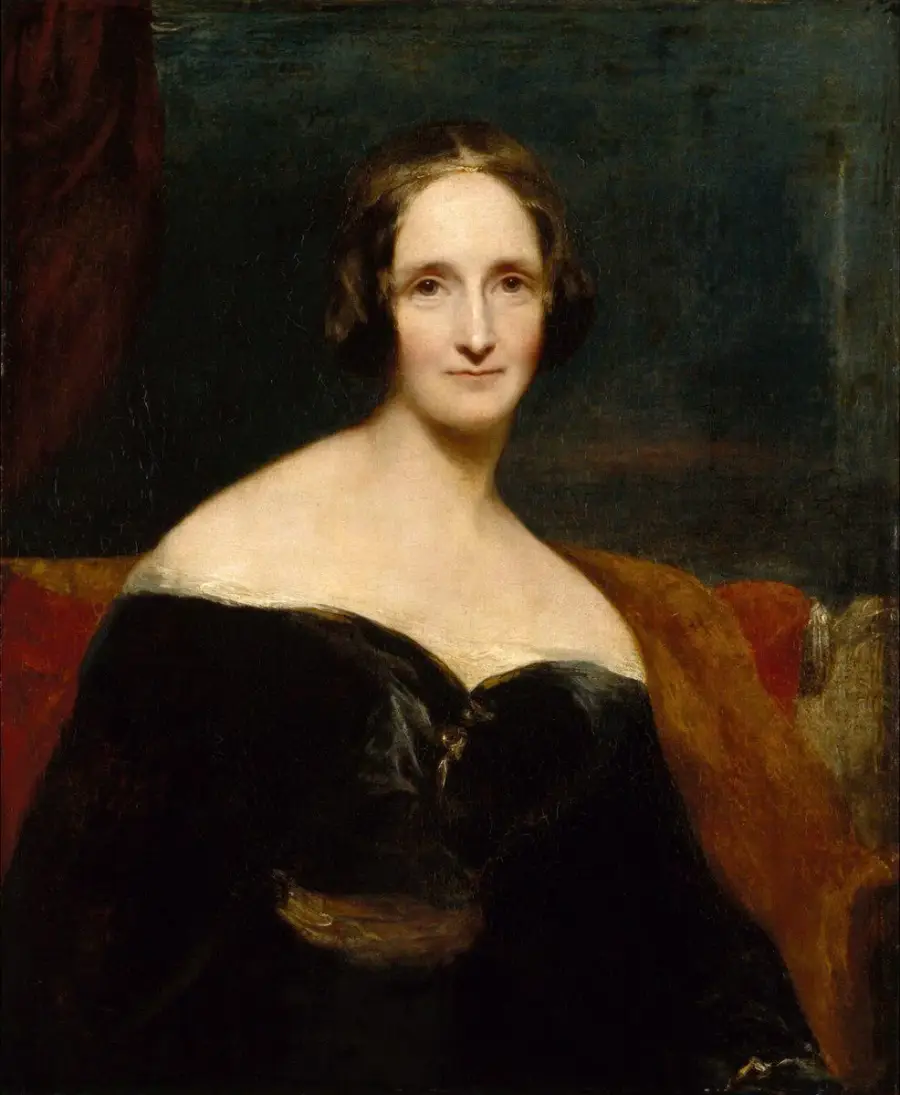 Portrait painting of a woman with pale skin and dark hair, wearing an off-the-shoulder black dress, seated against a dark background with hints of red and orange fabric.