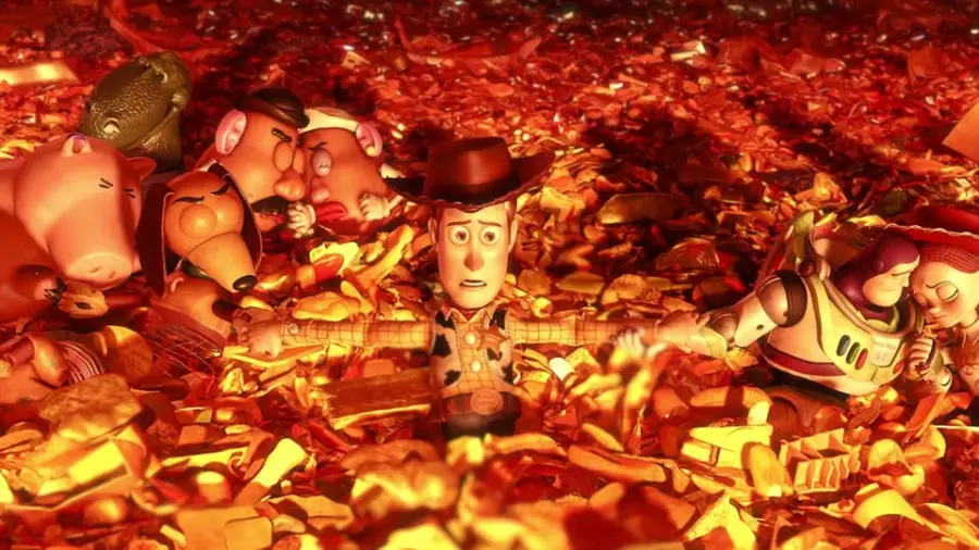 Woody and his friends, including Buzz Lightyear, Jessie, Mr. Potato Head, and Hamm, hold hands surrounded by glowing orange and yellow debris, looking concerned and emotional.