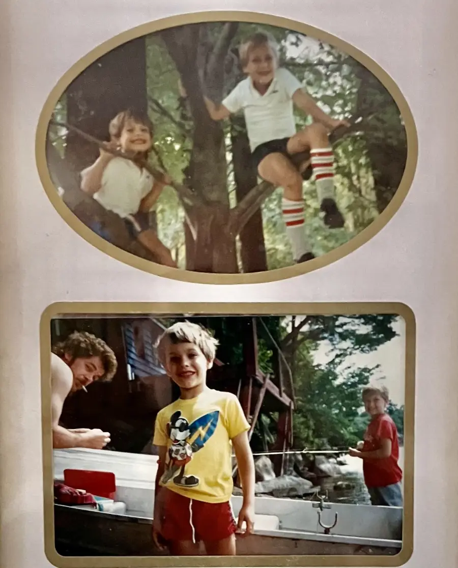 Two childhood photos: Top, two kids sit on tree branches smiling. Bottom, three boys stand near a boat and water, one in a yellow Mickey Mouse shirt, with trees and a cabin in the background.