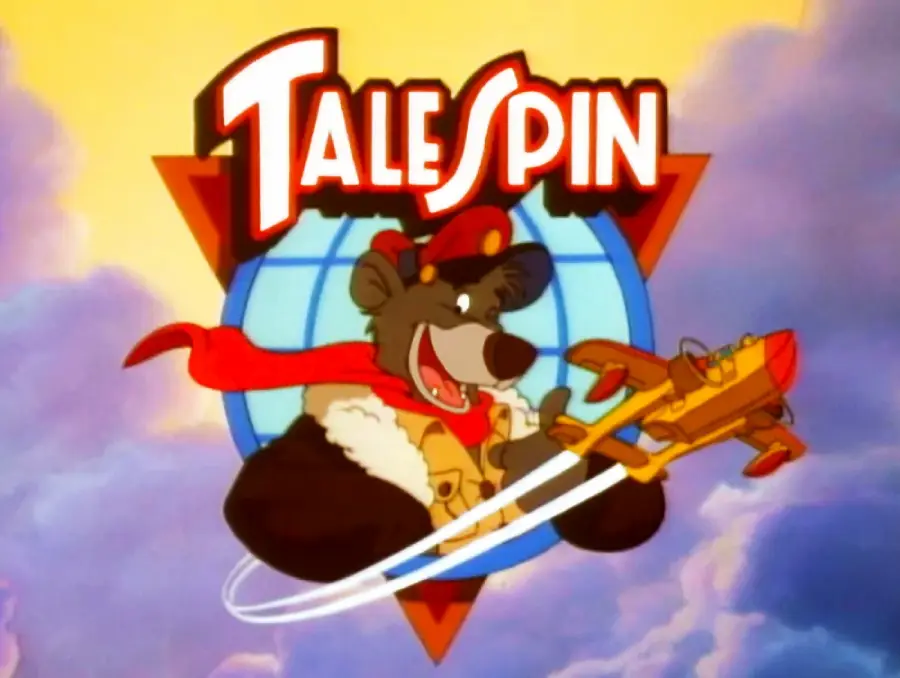 The “TaleSpin” logo with a cartoon bear in aviator gear flying a yellow and red plane against a sky background, framed by a triangle and globe.