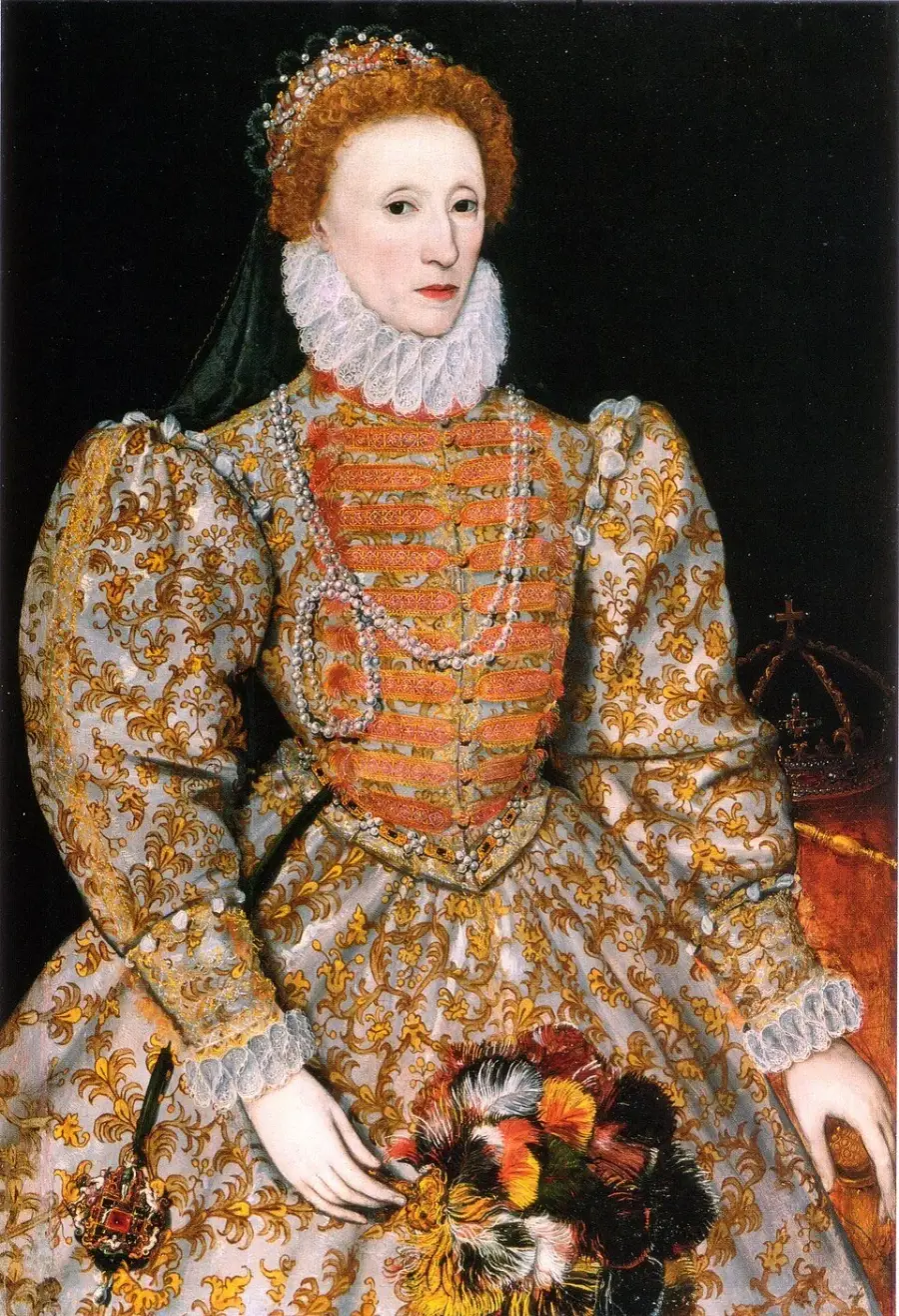 A formal portrait of a pale woman in elaborate Elizabethan dress with puffed sleeves, a lace ruff, and pearls, standing by a royal crown on a dark background, holding a colorful feathered fan.