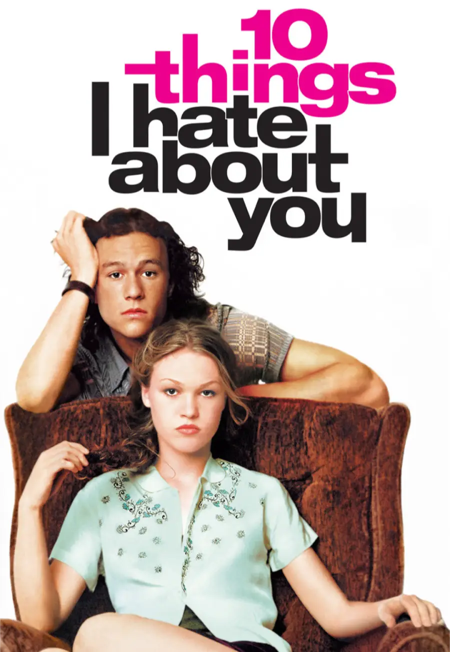 Two young people sit on a brown chair, one leaning on the back, the other sitting in front. Large text above them reads “10 Things I Hate About You.”