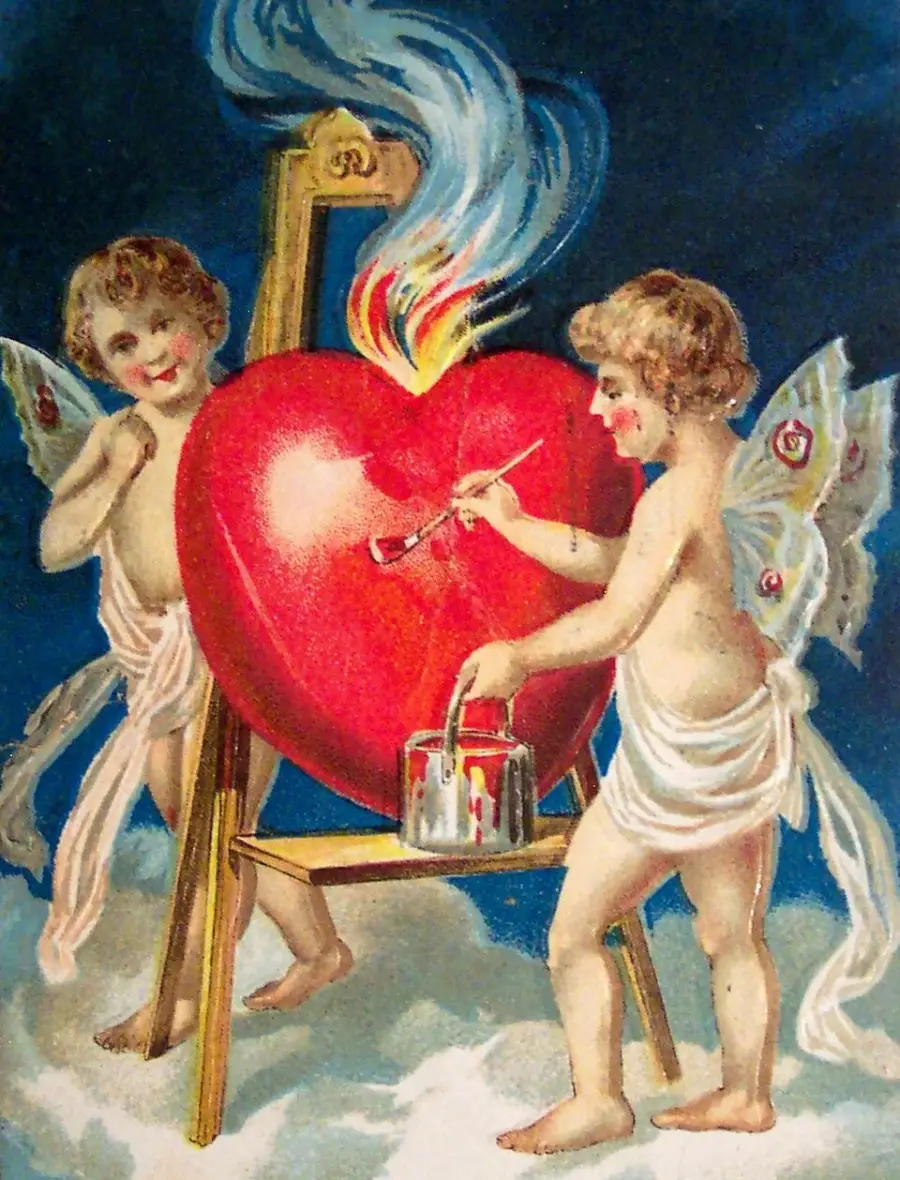 Two cherubs with wings paint a large, flaming red heart on an easel. One cherub holds a brush, the other holds a paint can. Both stand on clouds under a dark sky.