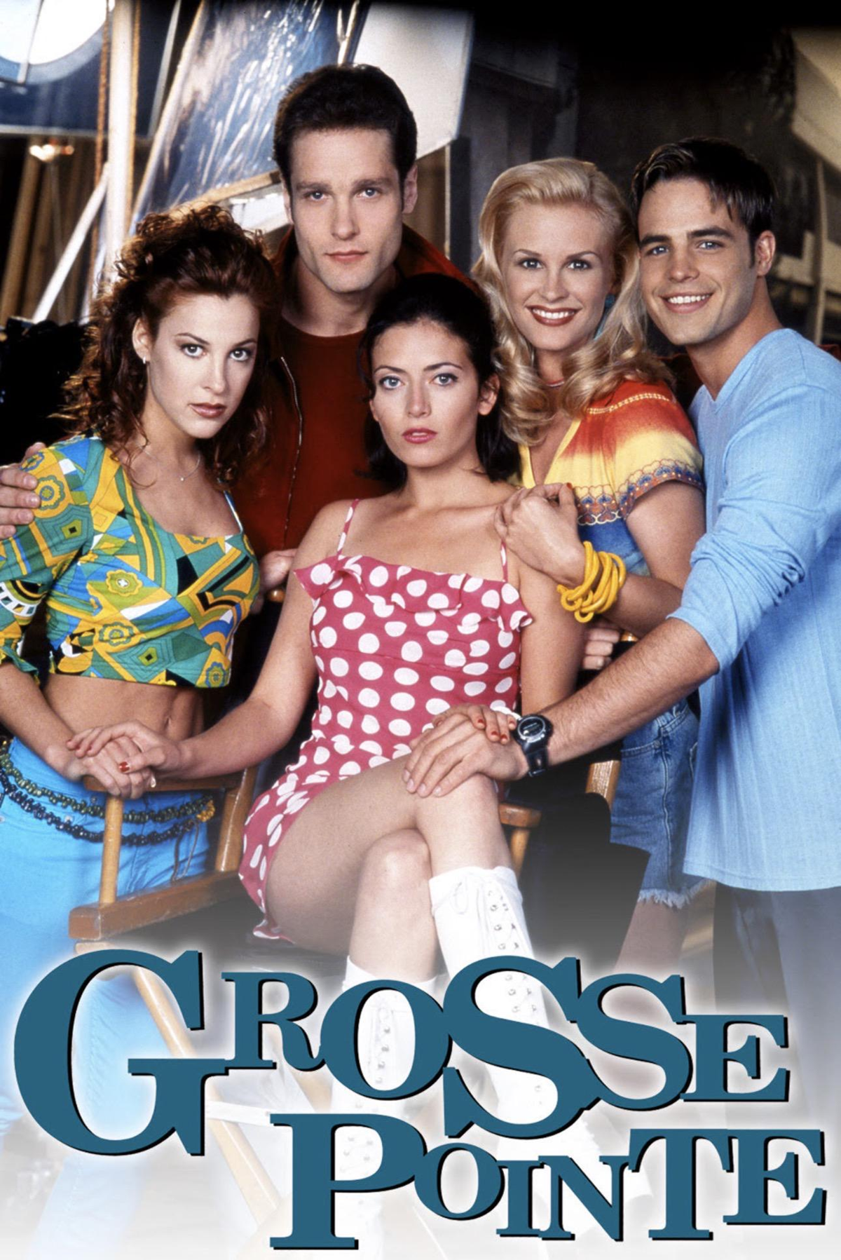 Five young adults pose together, dressed in colorful '90s-style clothes, with the title "Grosse Pointe" in large blue letters at the bottom of the image.