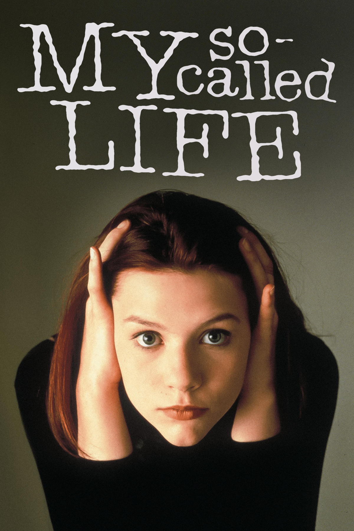 A young woman with red hair holds her head with both hands and looks up with a serious expression. The text above her reads "MY so-called LIFE" in bold, white, stylized letters.