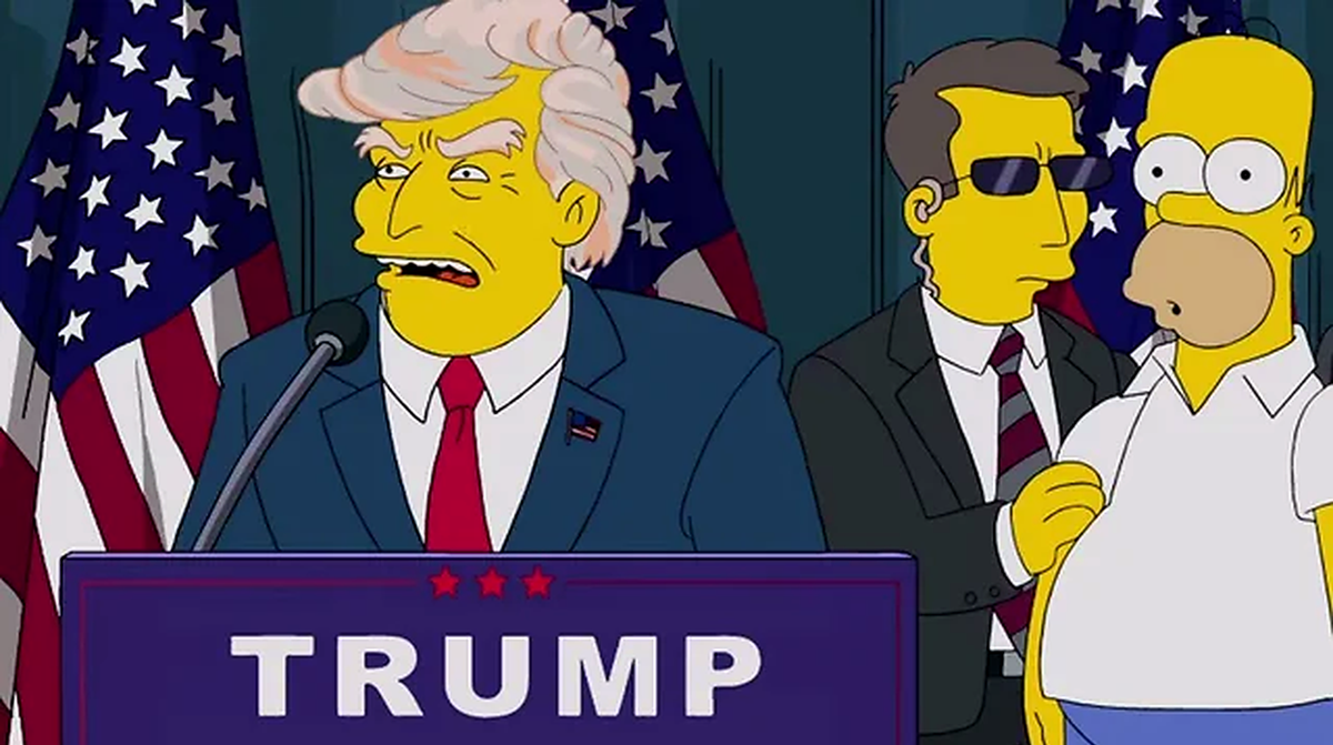 Animated scene with a man speaking at a podium labeled “TRUMP,” flanked by a bodyguard in sunglasses and another yellow cartoon character, with U.S. flags in the background.