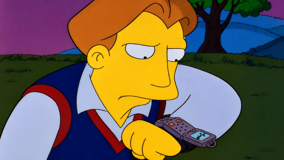 Animated character with brown hair and a blue vest looks at a device on their wrist, which has a small screen displaying an image, with a grassy background and a tree behind them.