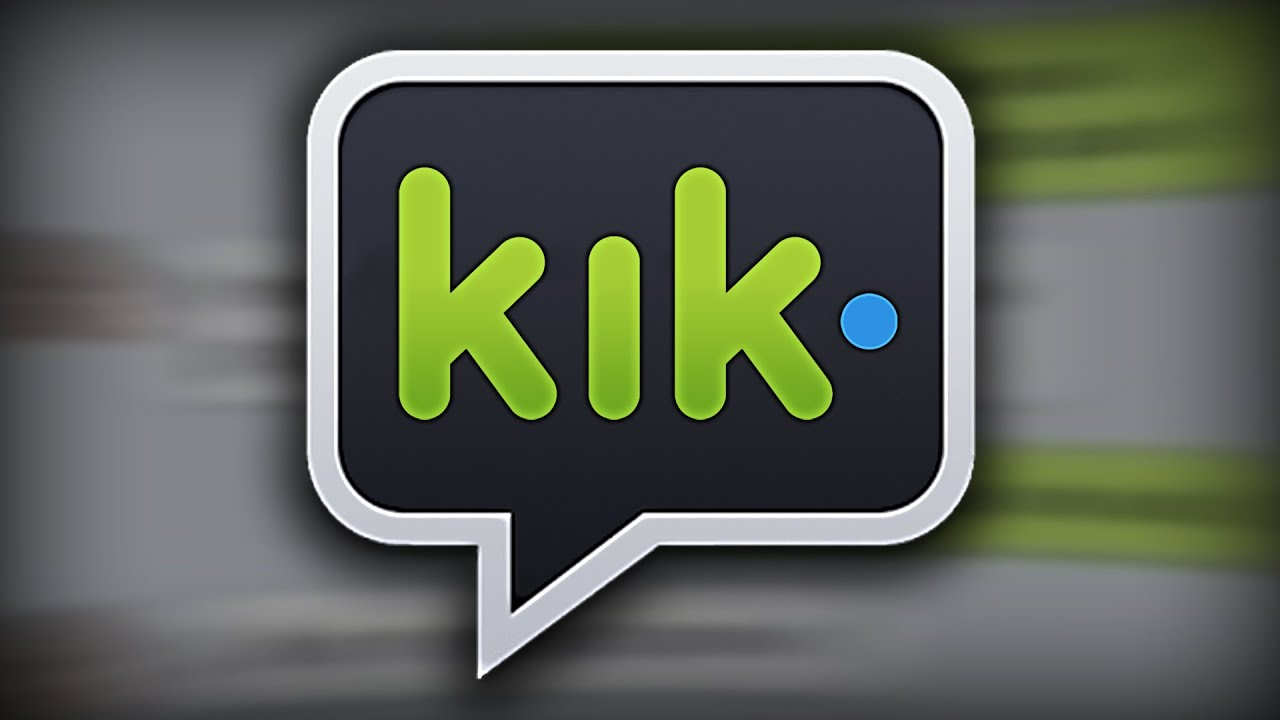 The image shows the Kik Messenger logo, featuring "kik" in green lowercase letters with a blue dot, inside a black speech bubble with a light gray outline. The background is blurred.