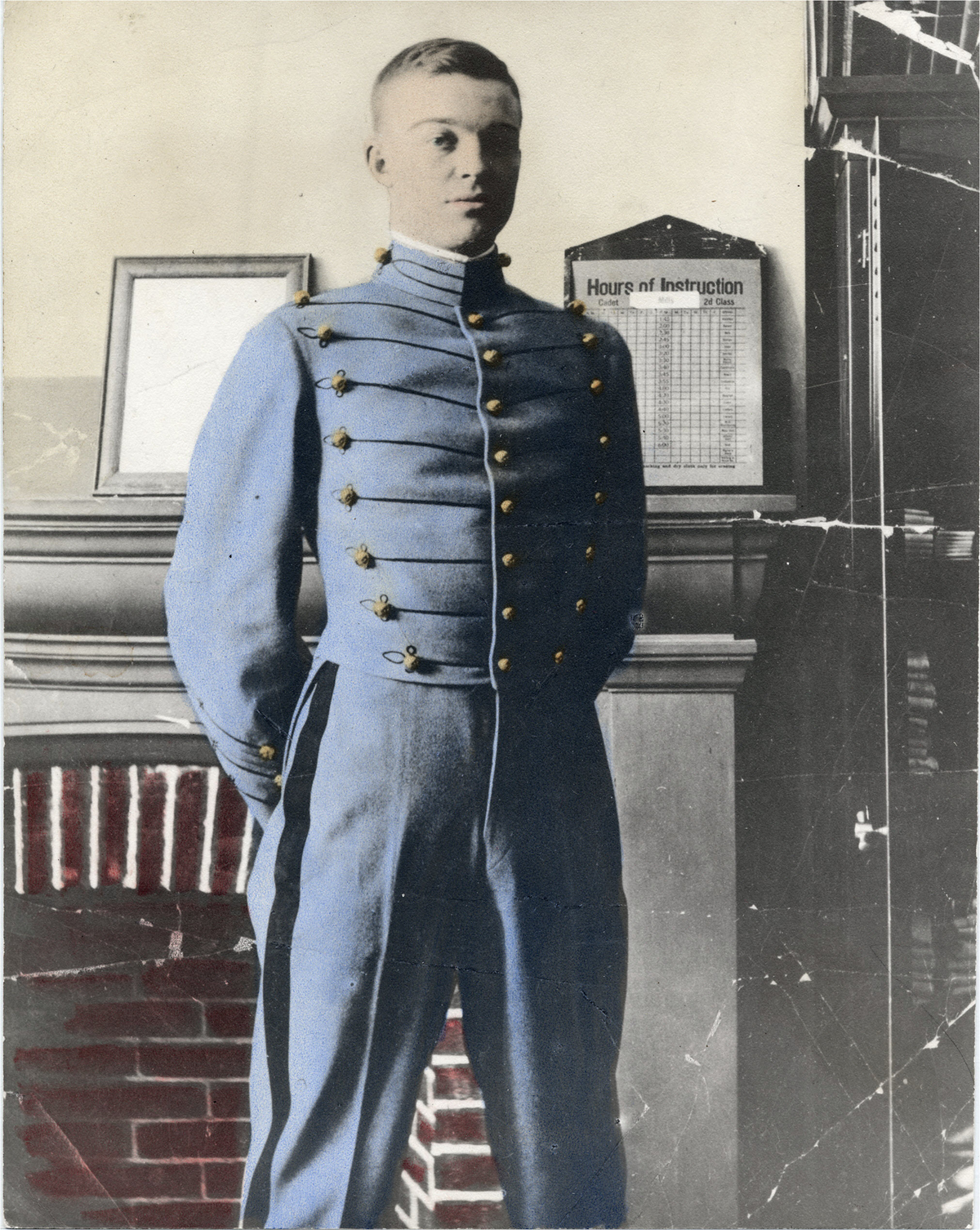 A young man in a light blue military uniform with gold buttons stands in front of a mantel and a sign titled "Hours of Instruction." The image is partially colorized, with some black-and-white areas.