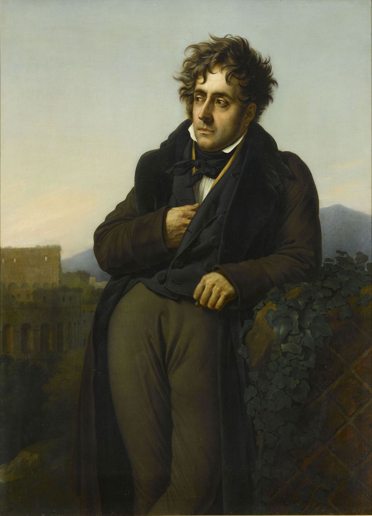 A man in 19th-century clothing leans on a stone ledge outdoors, looking pensively into the distance. His hand rests on his chest, and ancient ruins and hills appear in the background under a soft sky.