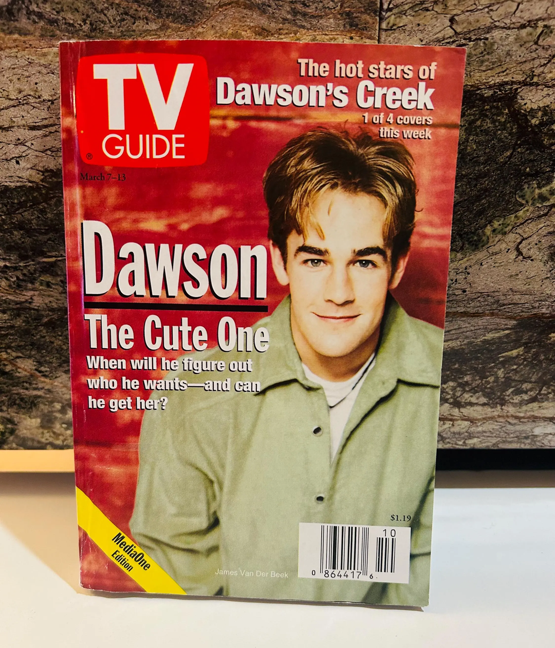 TV Guide magazine cover featuring a young man with light brown hair and a green shirt smiling at the camera. Headline reads: “Dawson, The Cute One,” promoting "Dawson’s Creek.