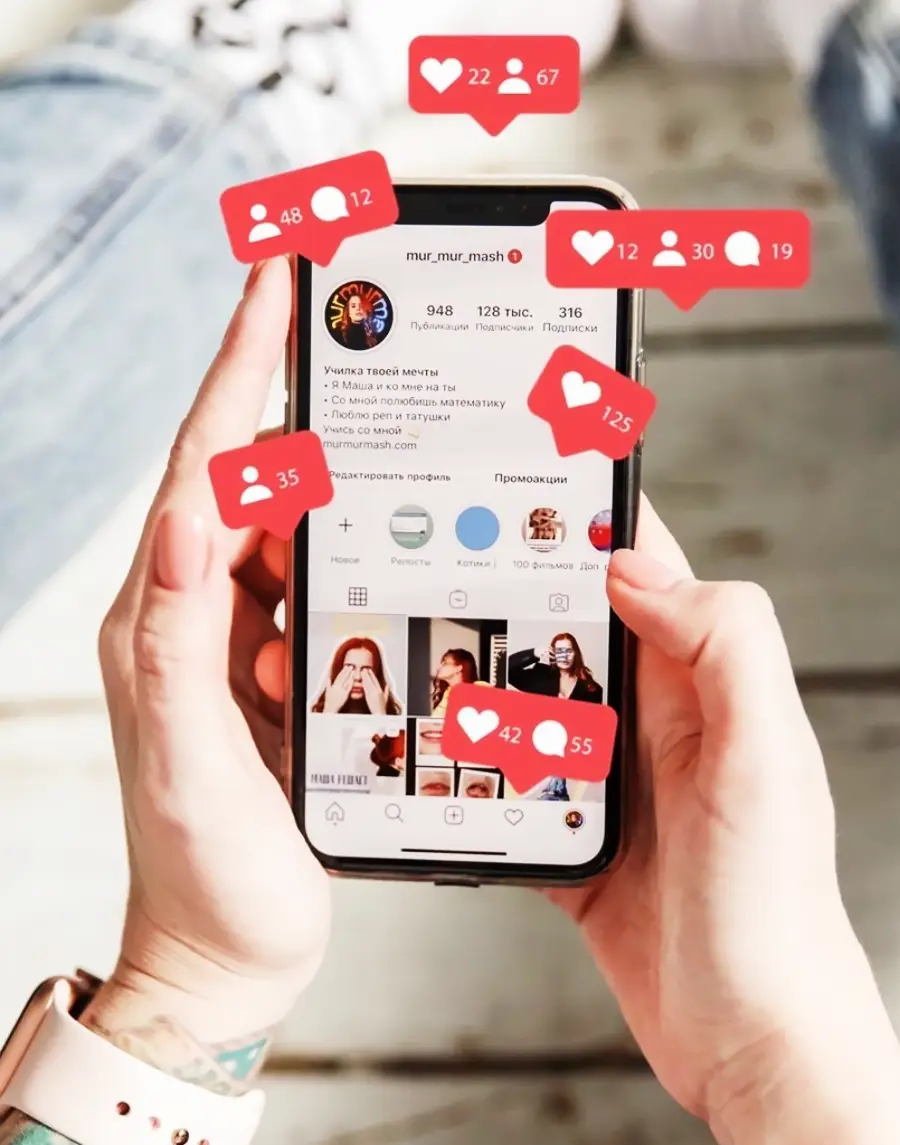 A person holds a smartphone displaying an Instagram profile with numerous like, comment, and follower notification icons floating above the screen.