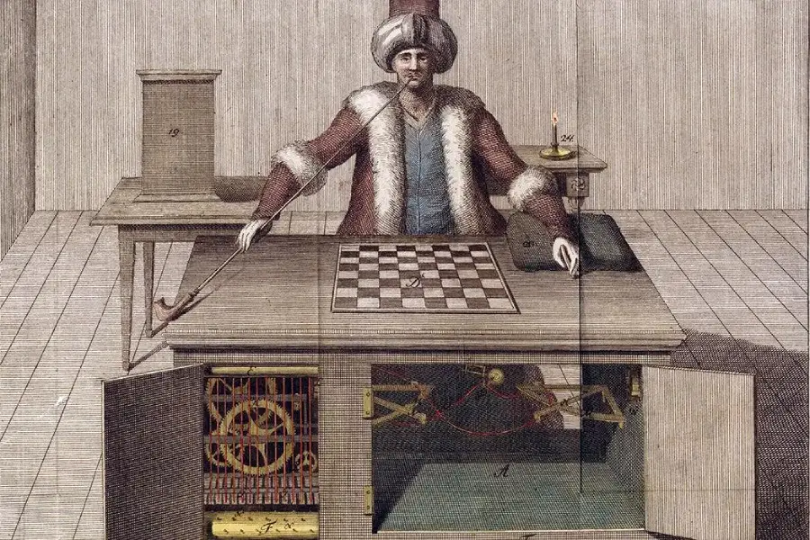 An illustration of a man in a robe and turban sitting at a chessboard, with a cabinet beneath the board open to reveal mechanical gears and parts inside.