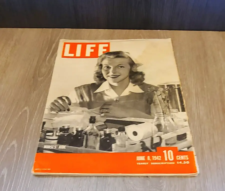 An old LIFE magazine cover dated June 1, 1942, shows a smiling nurse in uniform surrounded by medical supplies. The cover price is 10 cents and the annual subscription is $4.50.