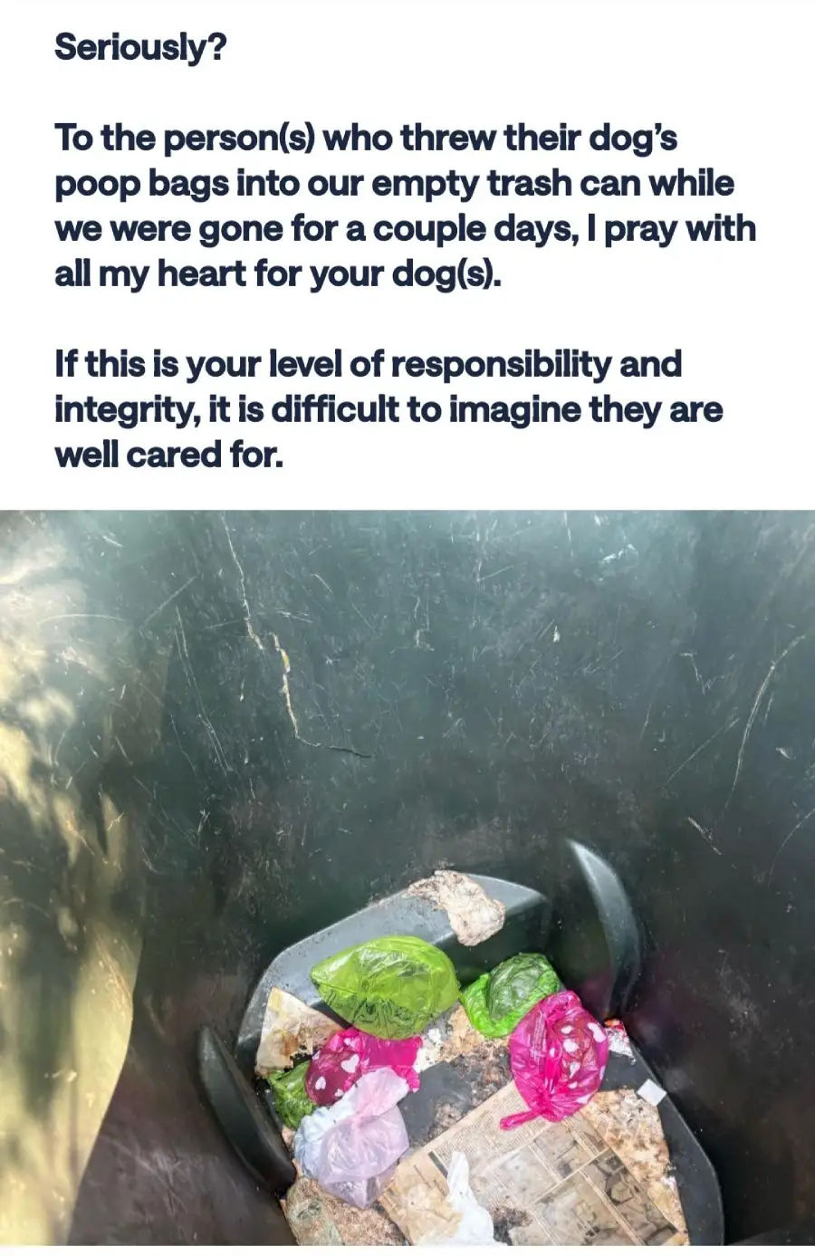 A trash can filled with garbage and several colorful bags of dog poop. Above the can is a note expressing frustration about others using the bin for pet waste.