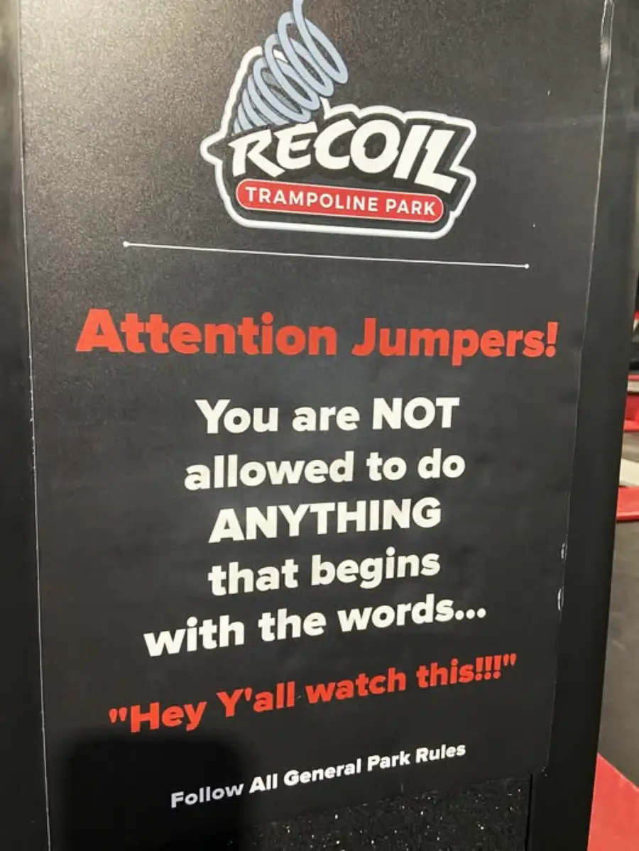 A sign at Recoil Trampoline Park reads: "Attention Jumpers! You are NOT allowed to do ANYTHING that begins with the words… 'Hey Y'all watch this!!!' Follow All General Park Rules.