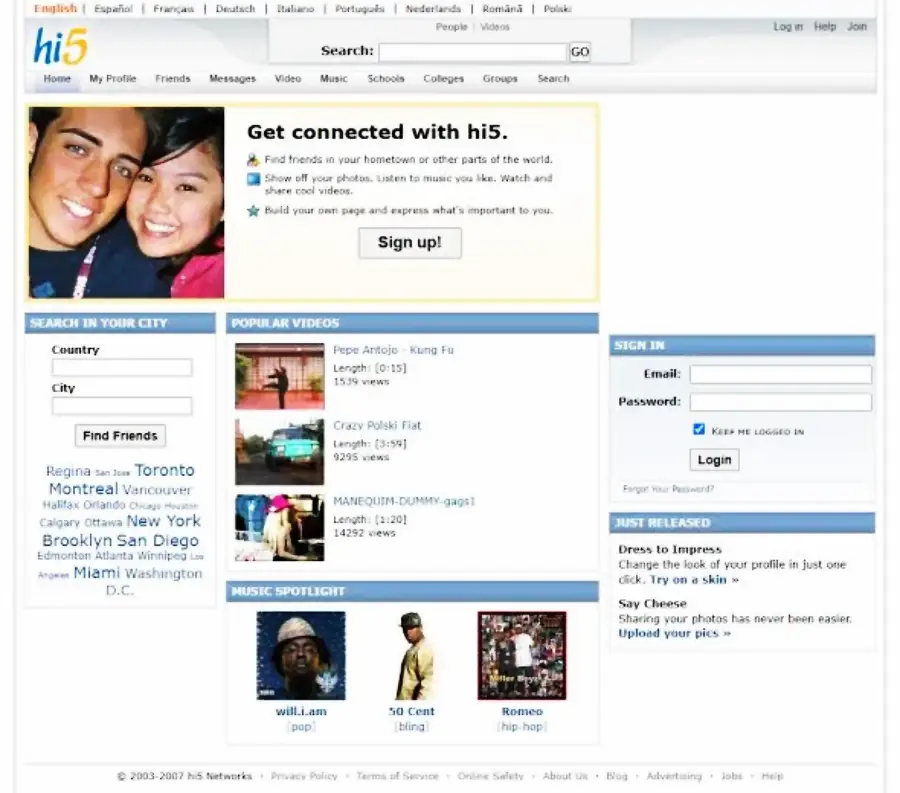 Screenshot of the hi5 social network homepage featuring a login form, a sign-up prompt with a smiling couple, popular videos, music spotlights, and a city search with a blue and white color scheme.