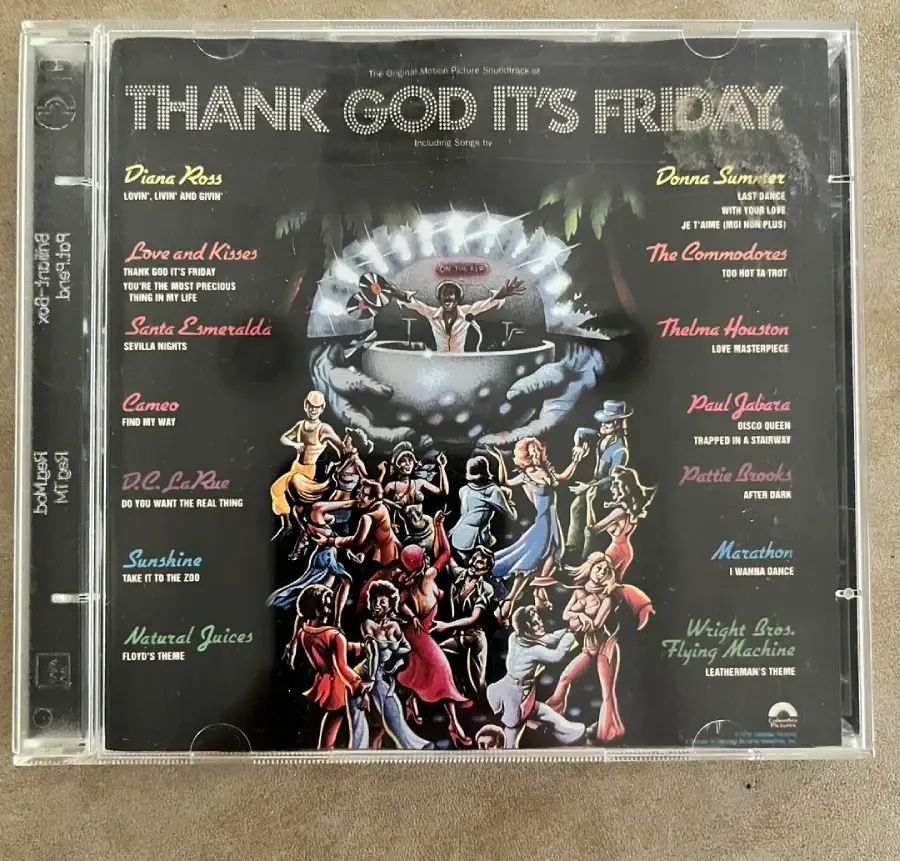 CD cover for "Thank God It's Friday" soundtrack. Groups of people dance around a disco floor, with a DJ booth above. Song artists and titles are listed on both sides in bright colors. Title appears at the top in large text.