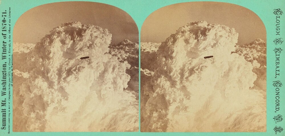 A stereoscopic image shows a snow-covered structure on Mount Washington’s summit in winter, 1870-71, with thick ice and frost obscuring most details.