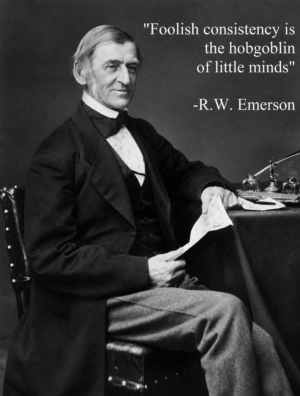 Black and white photo of an older man in a suit sitting with a paper in hand. Quote on image: “Foolish consistency is the hobgoblin of little minds” - R.W. Emerson.