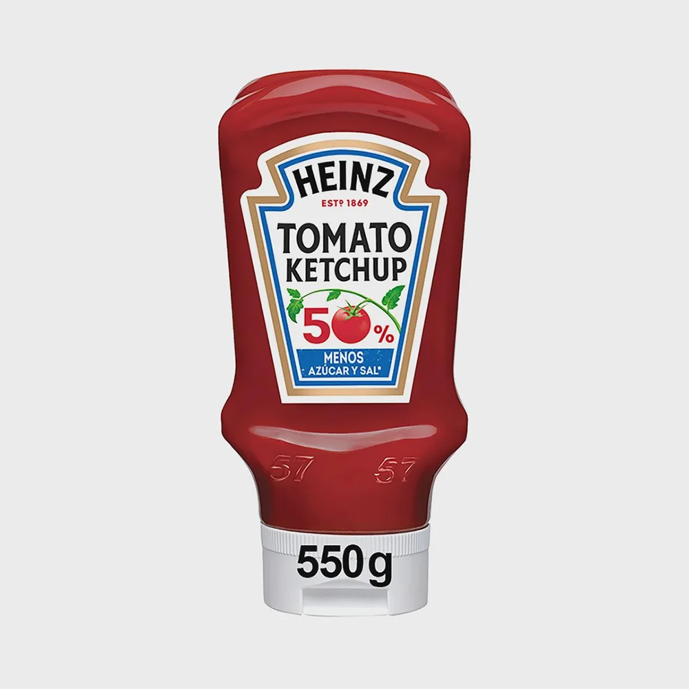 Heinz Tomato Ketchup bottle, 550g size, labeled “50% menos azúcar y sal” (50% less sugar and salt) on a white background.