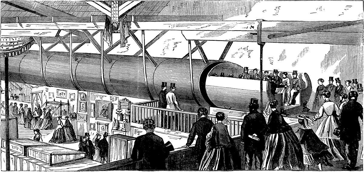 Victorian-era illustration of people observing and entering a large cylindrical transportation tube, with onlookers and exhibition displays in the foreground. The scene is busy, with men and women dressed in period clothing.