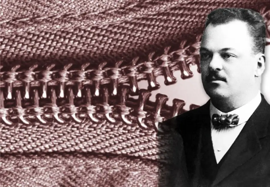 A close-up of a zipper is shown in the background, with a black-and-white portrait of a man in a suit and bow tie in the foreground on the right side.