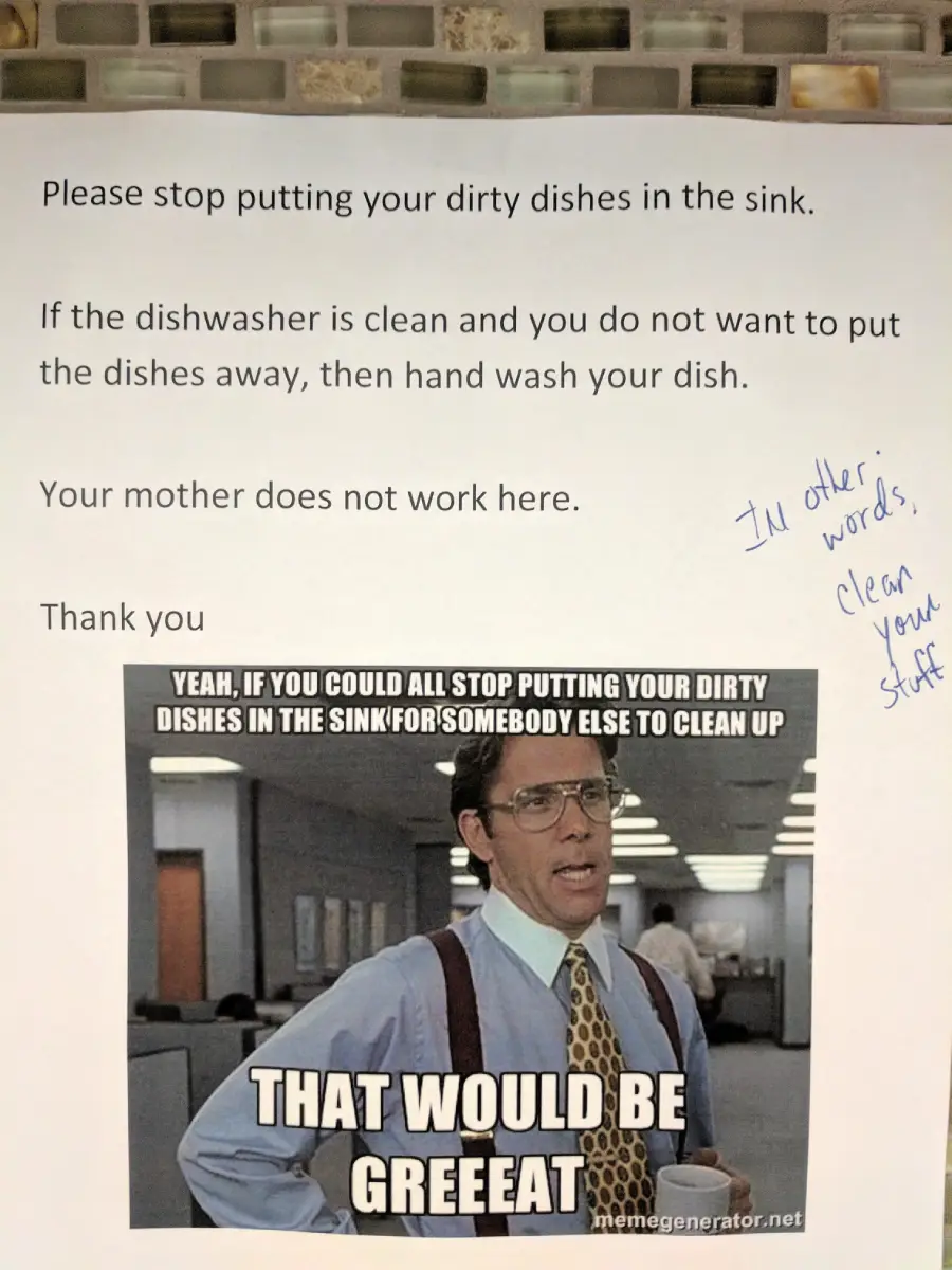 A printed note asks people to not leave dirty dishes in the sink. A meme of a man in glasses says, “That would be greeeaat.” Handwritten text says, “In other words, clean your stuff.”