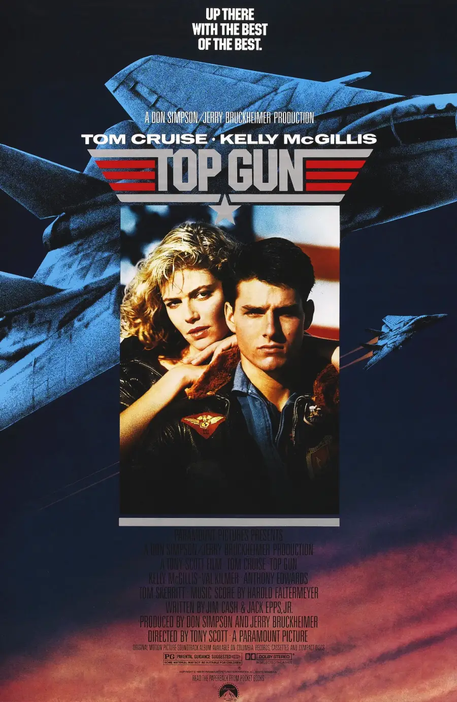 Top Gun movie poster featuring Tom Cruise and Kelly McGillis in front of a fighter jet, with the film title and tagline ‘Up there with the best of the best.’“