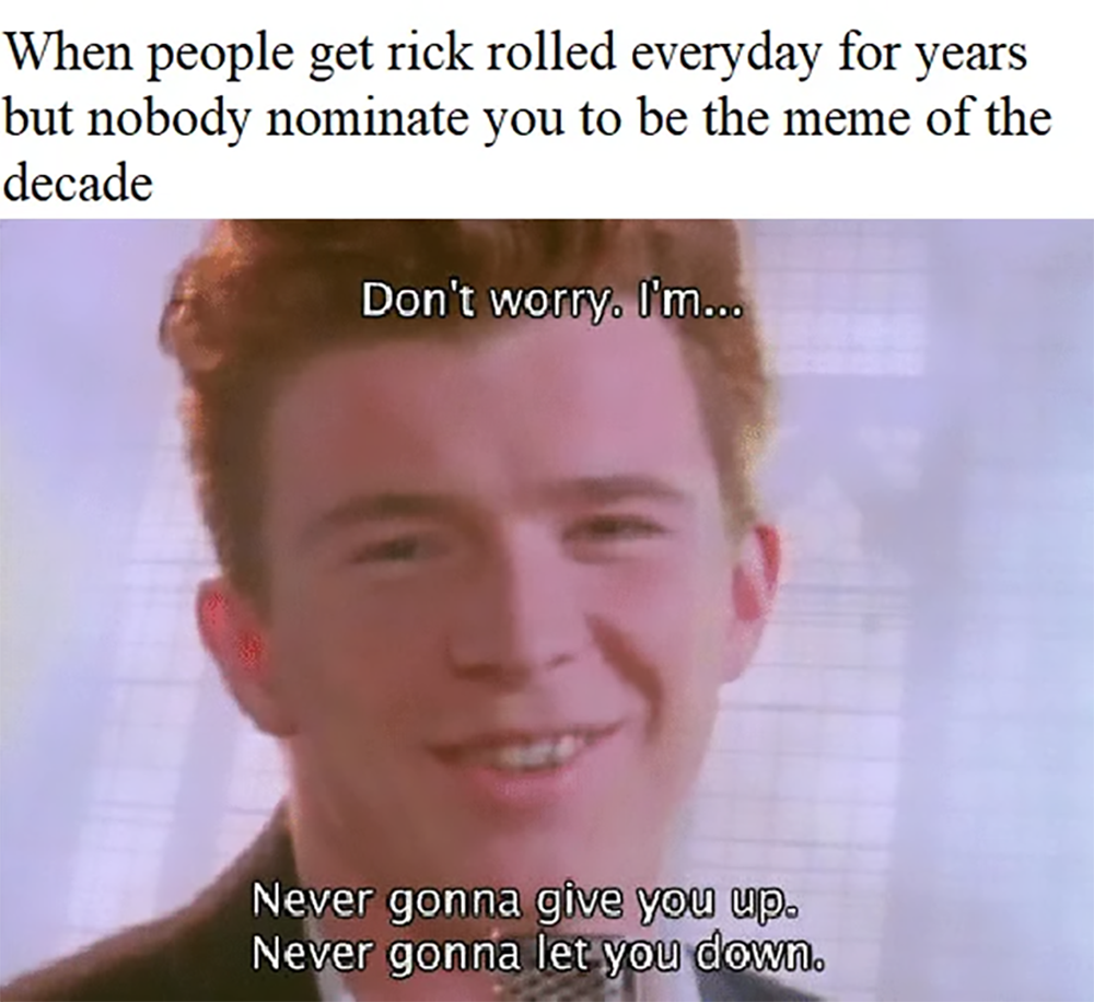 A man smiles with text: “Don’t worry, I’m... Never gonna give you up. Never gonna let you down.” Meme text above jokes about not being nominated as meme of the decade despite being widely used.