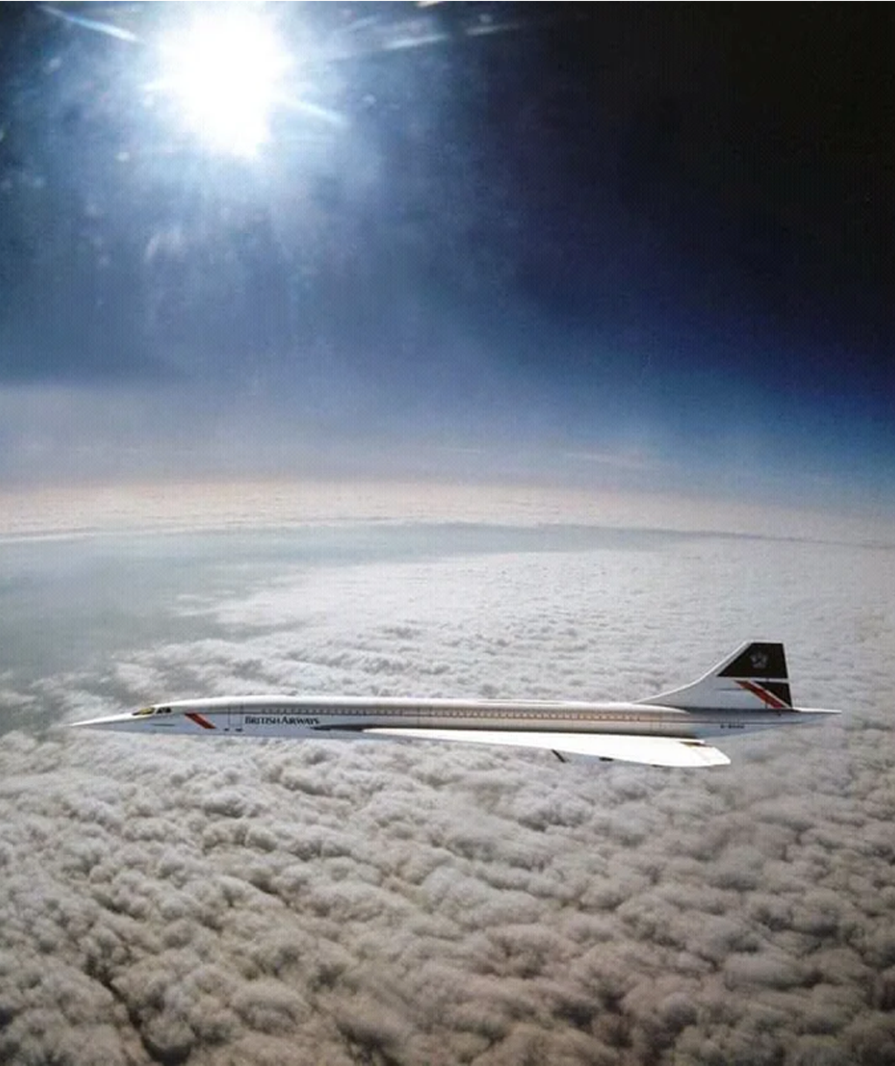 A British Airways Concorde jet flies above a blanket of clouds with the sun shining brightly in the sky, high above the Earth.