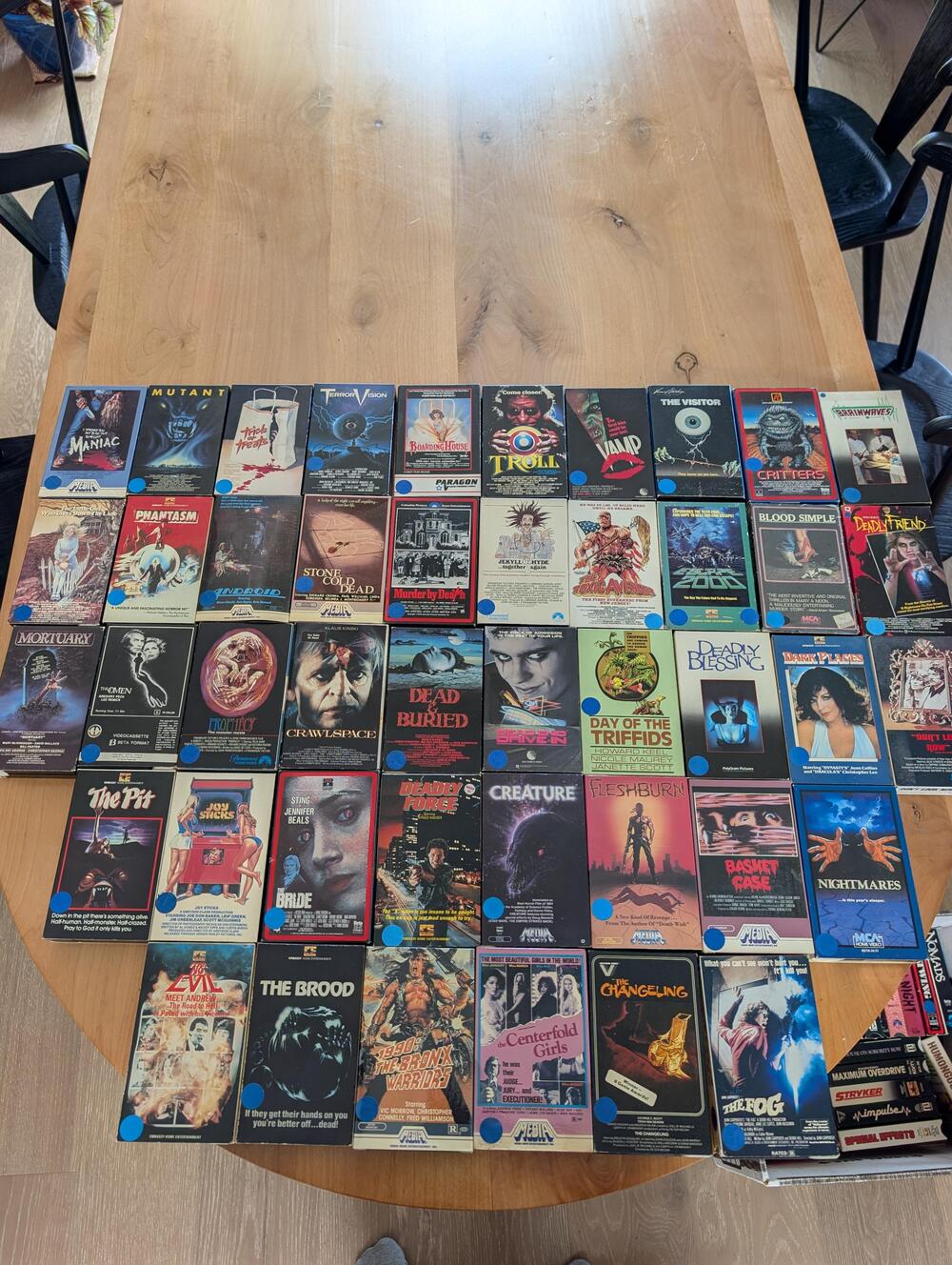 A collection of vintage rental tapes displayed together.