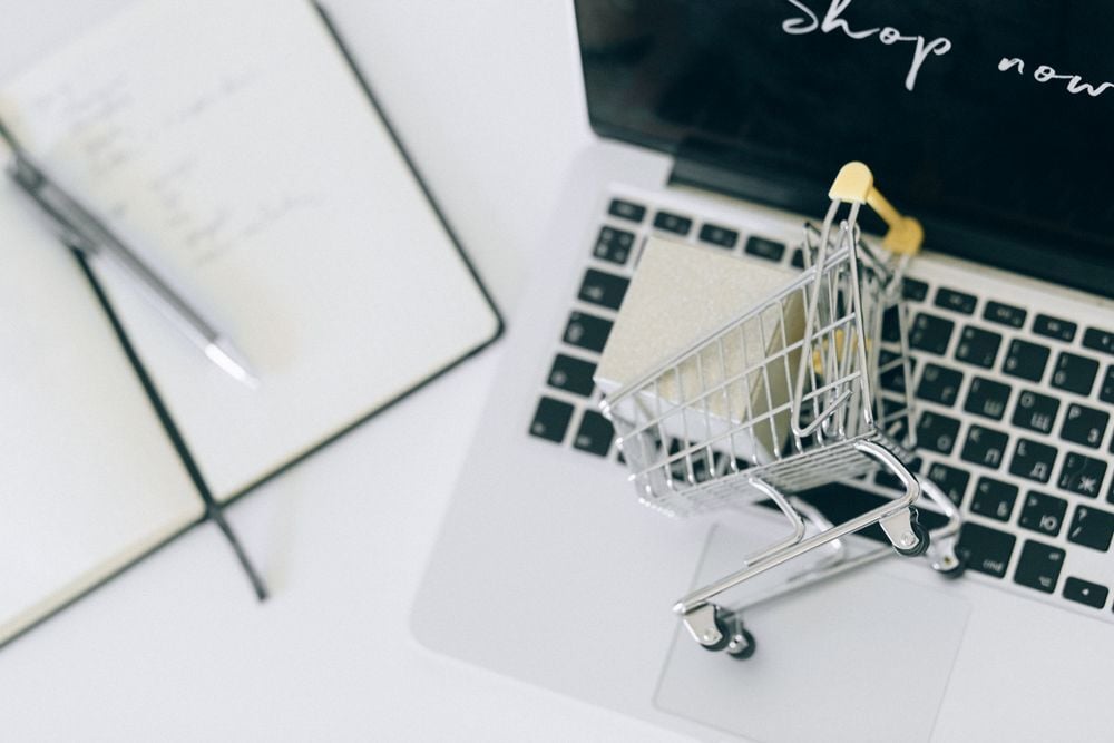 Online shopping cart on a laptop