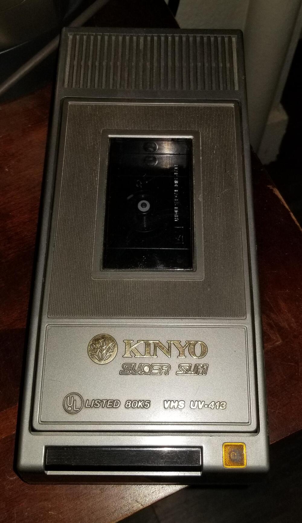 A separate Kinyo VHS rewinding machine.